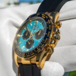Rolex Daytona 126518LN Yellow Gold Oysterflex Turquoise Dial side view